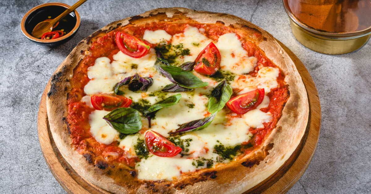 Pizza Margherita maison : les secrets d'un chef pour une cuisson parfaite